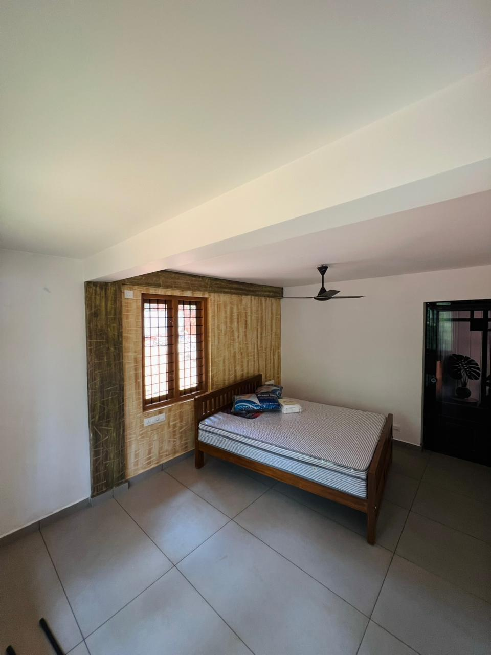 Bedroom with a made-up double bed at Ben & B's Stay
